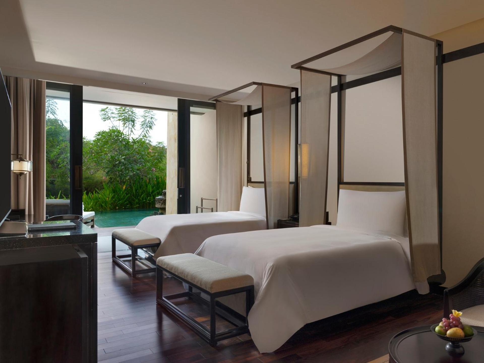 Habitación Grand Deluxe con 2 camas individuales y vistas a la laguna