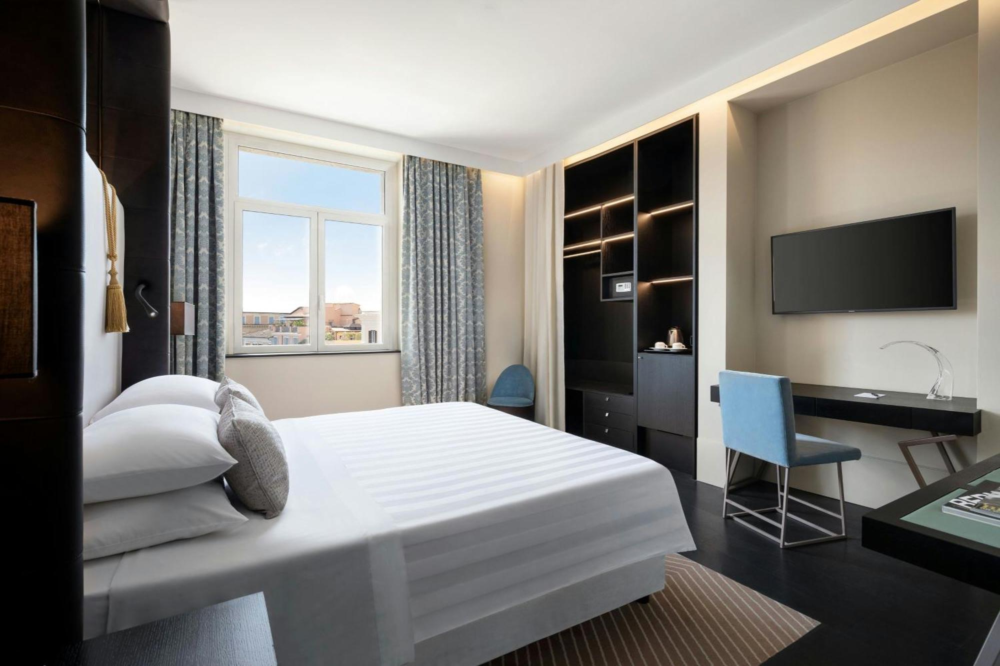 Habitación Deluxe Executive con cama extragrande y vistas a la ciudad